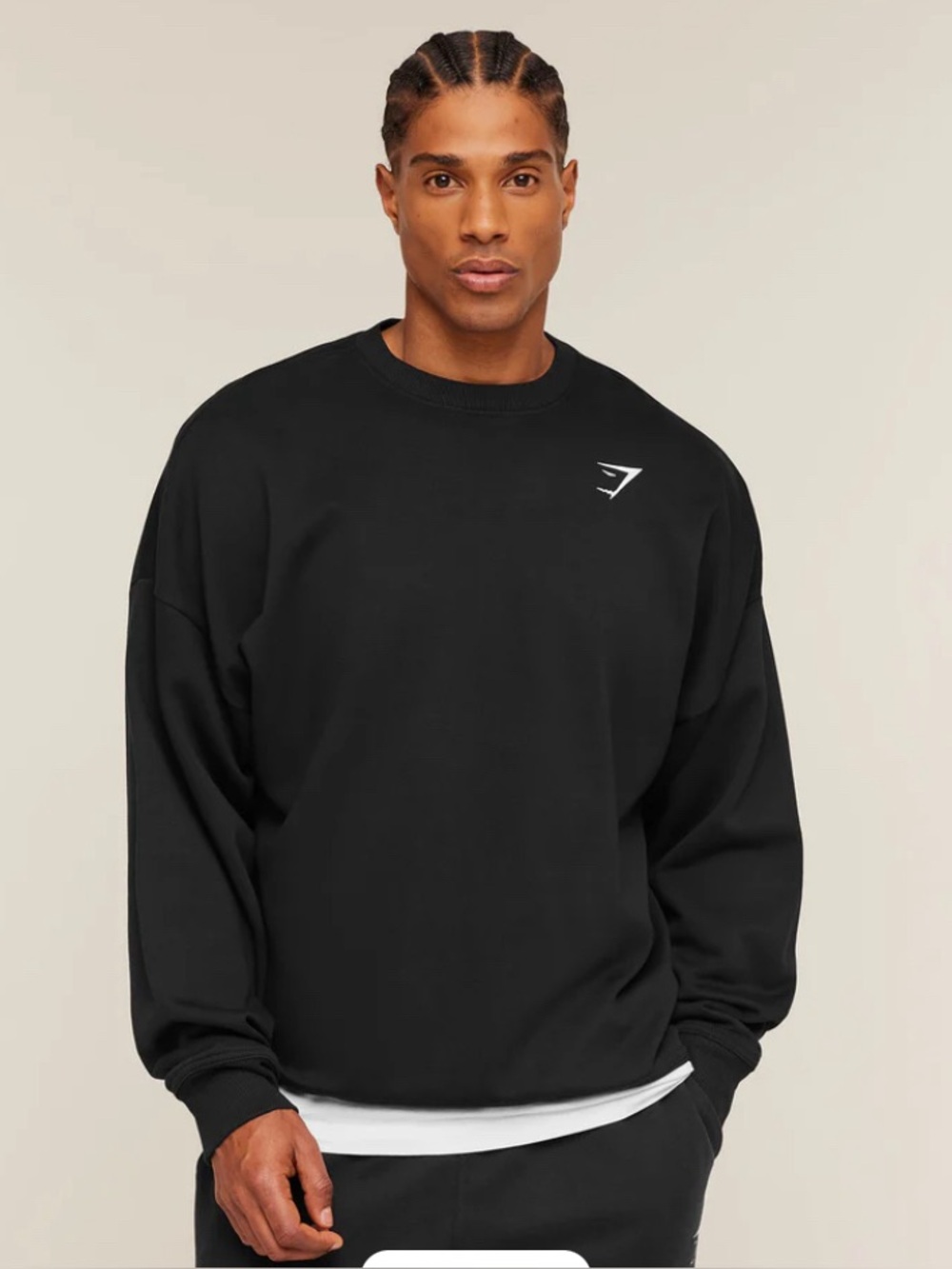 Gymshark black sweatshirt featuring an embroidered white logo on the chest sizeL